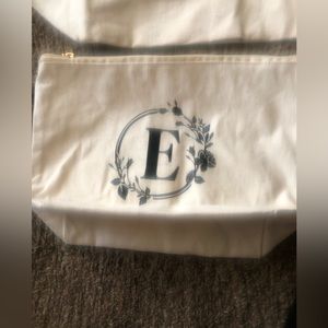 “E” Monogrammed Beach Bag and “E” Monogramed Makeup Bag Set New
Item 19